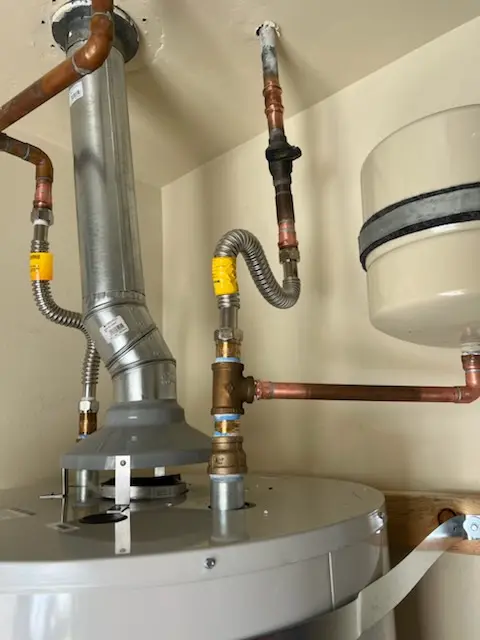 Water heater installation and plumbing repair in Cully
